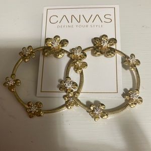 Gold with flowers and zirconia these are on heavy side